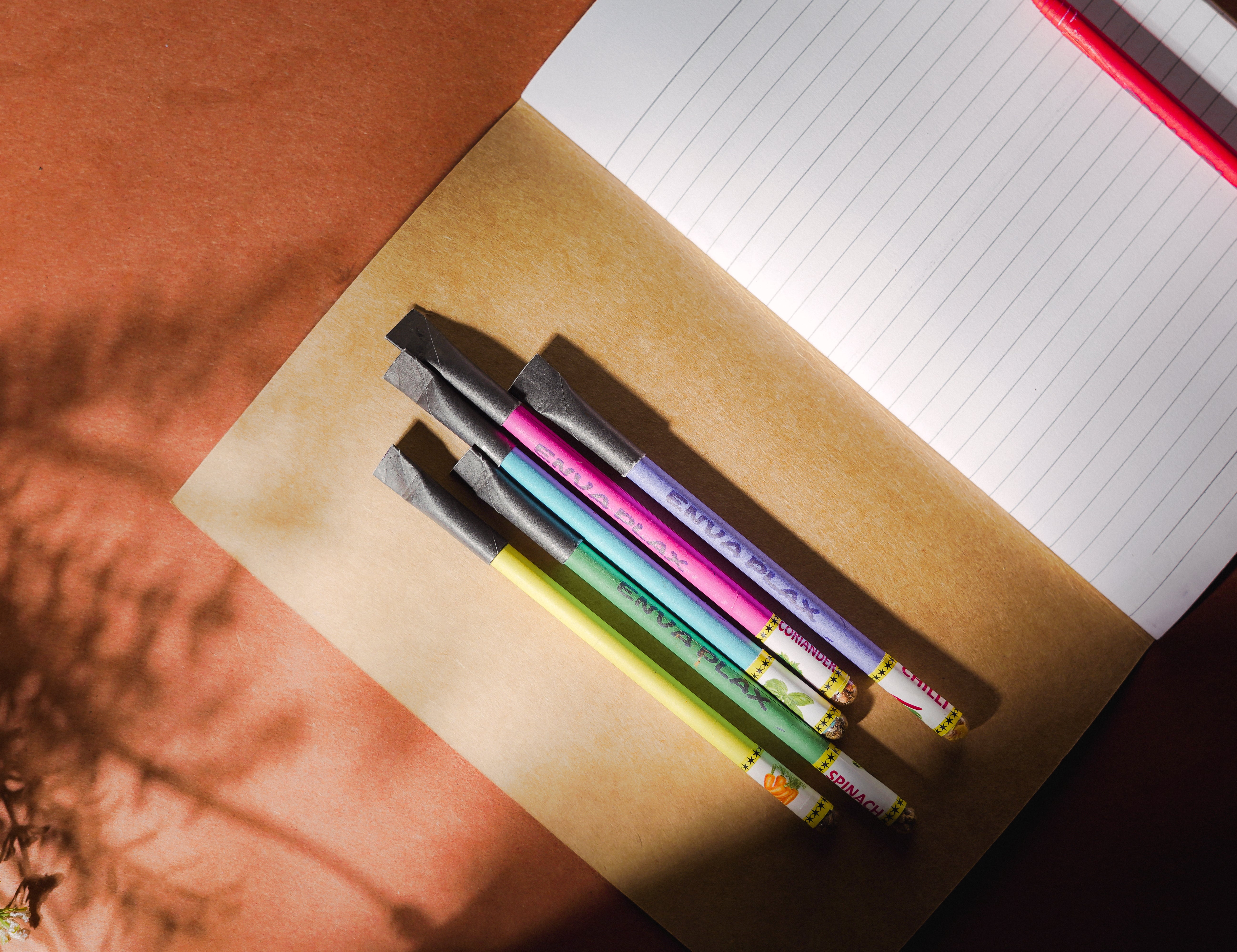 Artistic shot of a brown cover diary with recycled pages turned