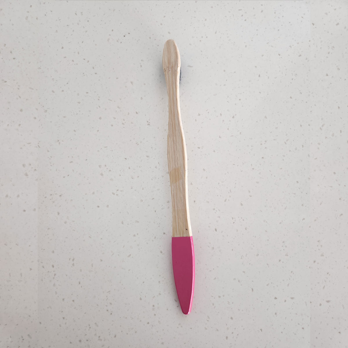 Handcrafted bamboo toothbrush with dipped end for better handling